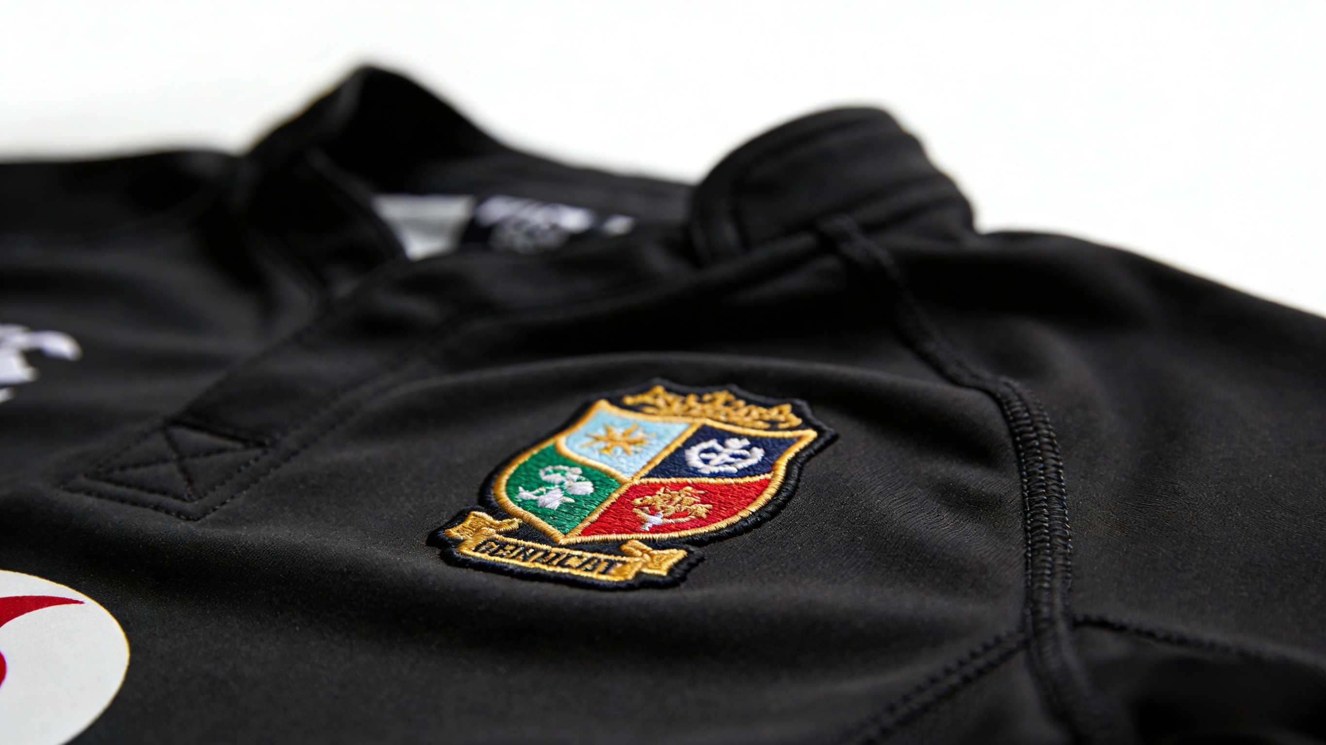 The All Blacks Spirit: What Makes the New Zealand National Team Iconic? 4 Detail of high-quality All Blacks rugby jersey fabric