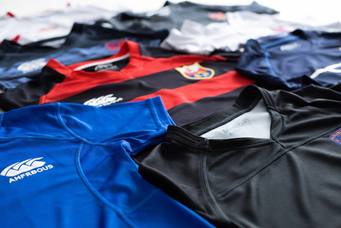 Different rugby jersey materials showing texture and fabric variety